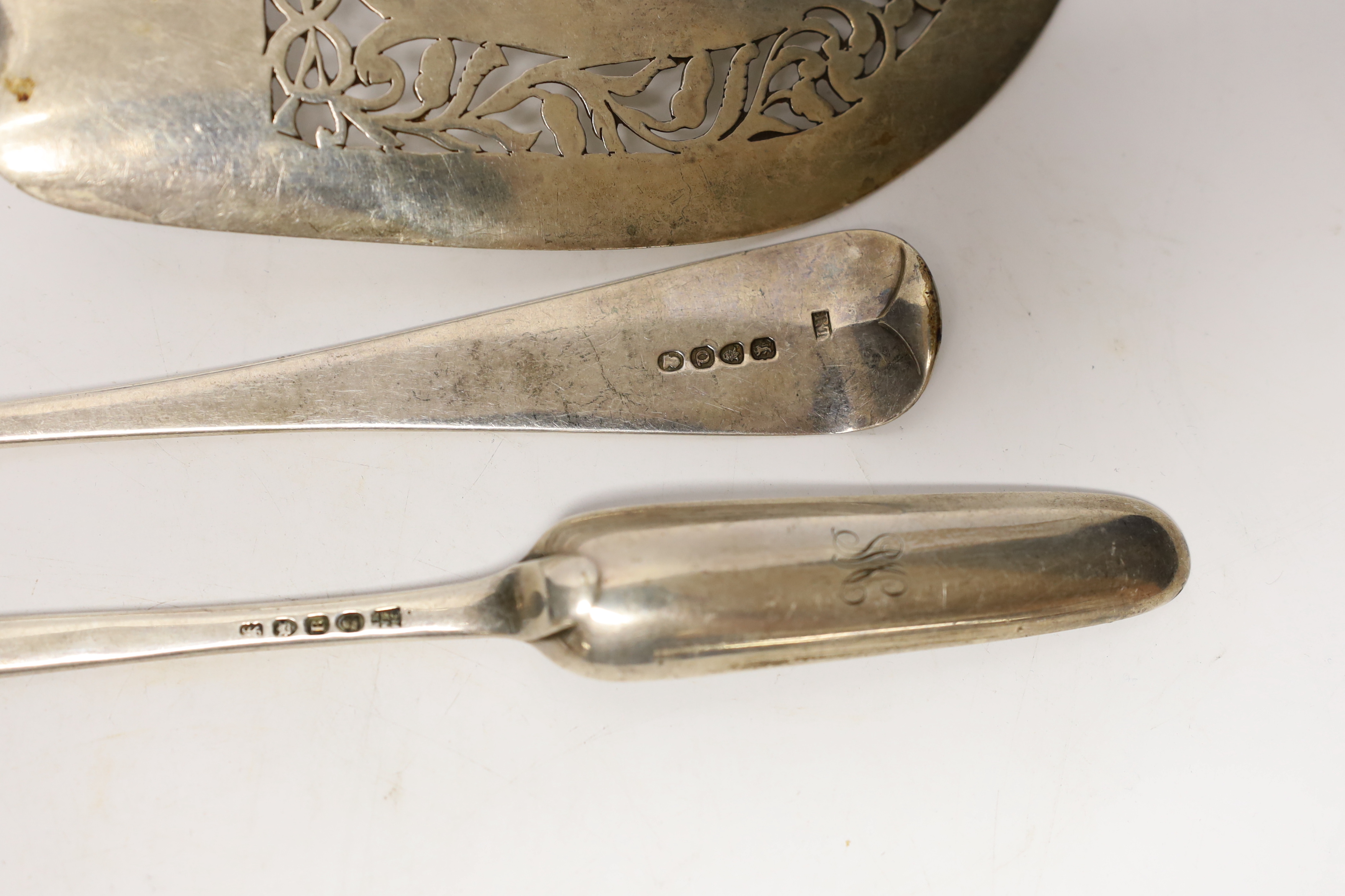 A George III silver marrow scoop, London, 1812, 22.7cm, a Victorian silver Old English pattern fish slice, London, 1838 and a George III silver basting spoon, London, 1811.